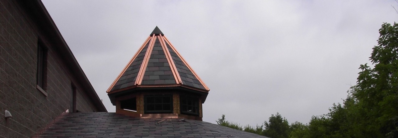 Whole View Of Synthetic Slate And Copper Roof